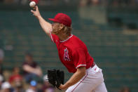 Los Angeles Angels starting pitcher Noah Syndergaard throws against the Oakland Athletics during the first inning of a spring training baseball game, Monday, March 28, 2022, in Tempe, Ariz. (AP Photo/Matt York)