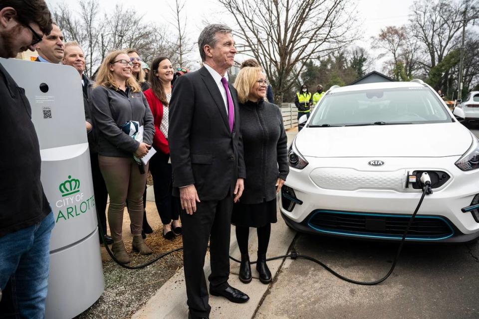 alpitronic Americas, an Italian manufacturer of high-power electric vehicle charging stations, will create 300 jobs  locate its U.S. headquarters and service center in Charlotte. Seen here in a 2022 file photo, Gov. Roy Cooper attended the unveiling of a charging station in Charlotte created by a partnership between the city, Duke Energy, Centralina Regional Council and UNC Charlotte. 


