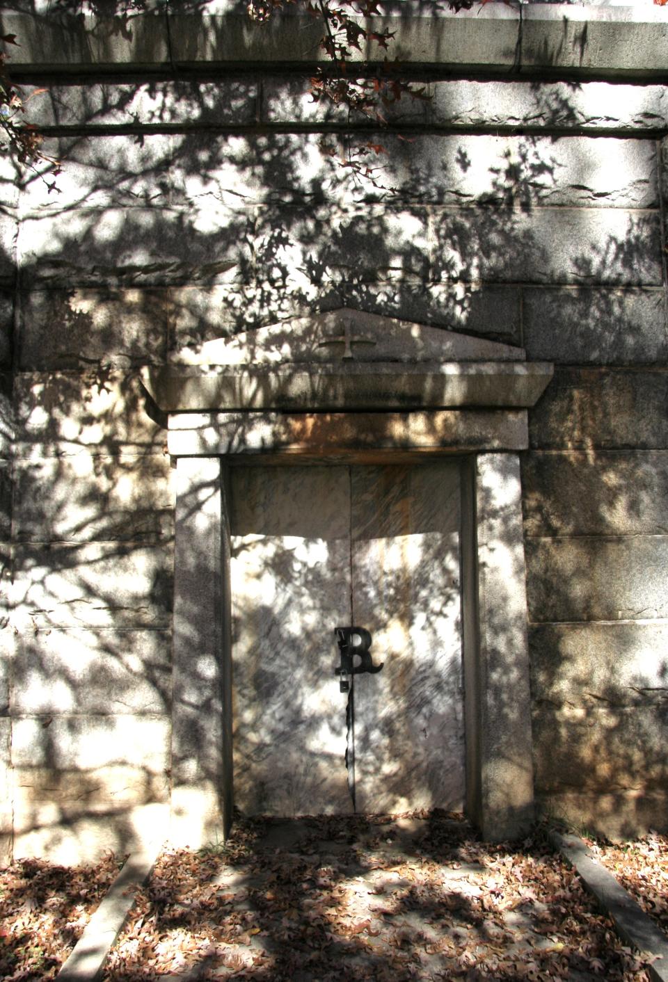 This Riverside Cemetery vault was built for the Rumboughs and Bakers. The hasp on the door is a combined B and R.