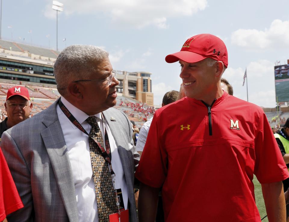 AUSTIN, TX – SEPTEMBER 02: Head coach D.J. Durkin of the Maryland Terrapins and athletic director Kevin Anderson walk off the field after defeating the Texas Longhorns at Darrell K Royal-Texas Memorial Stadium on September 2, 2017 in Austin, Texas. (Photo by Tim Warner/Getty Images)
