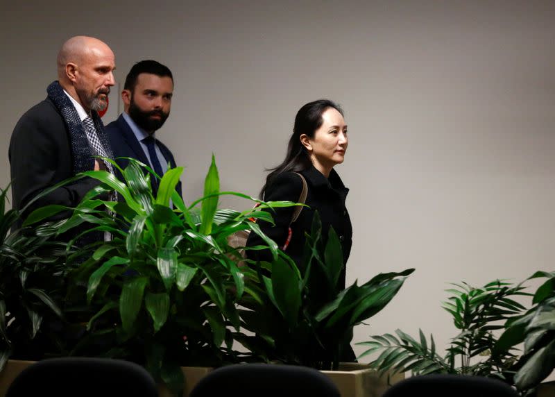 Huawei Chief Financial Officer Meng Wanzhou leaves B.C. Supreme Court for a lunch break during the first day of her extradition hearing in Vancouver