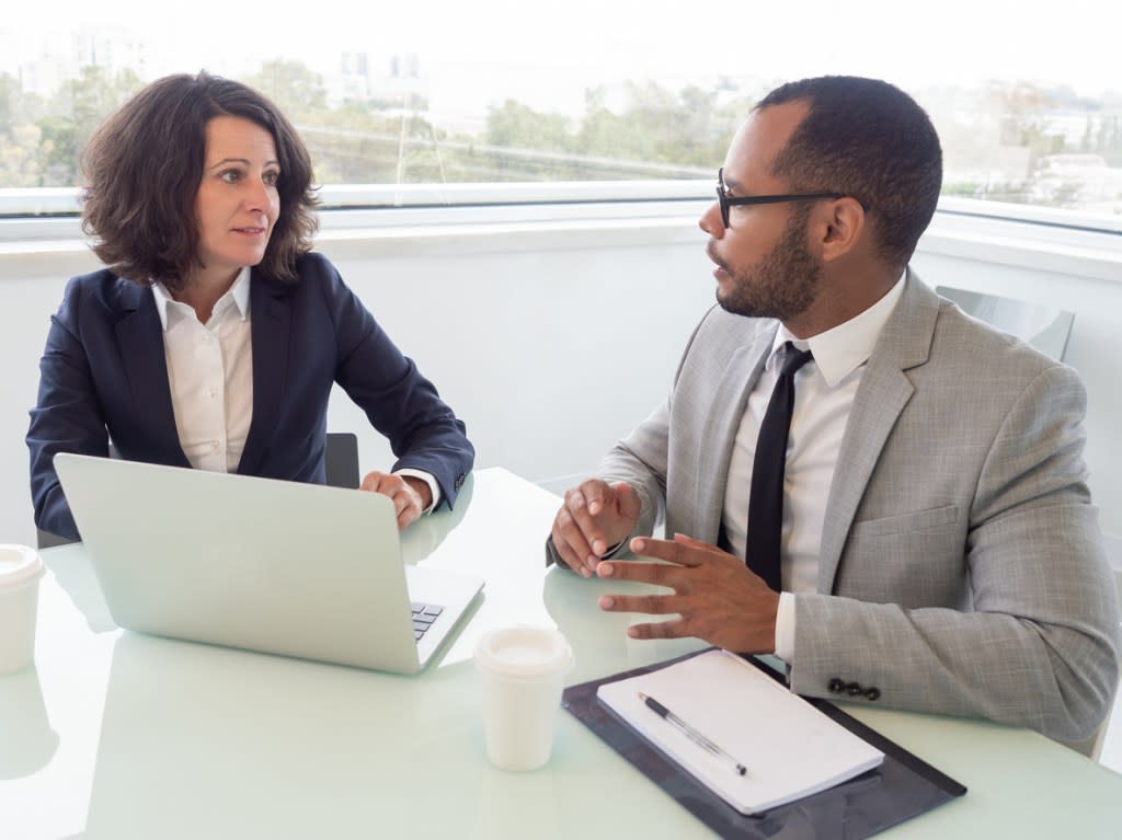 A financial advisor helping a client evaluate a startup.