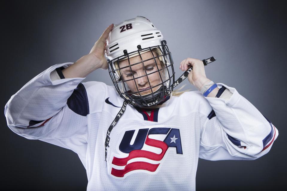 Olympic hockey player Amanda Kessel mimics her pre-game preparation during the 2013 U.S. Olympic Team Media Summit in Park City, Utah October 2, 2013. REUTERS/Lucas Jackson (UNITED STATES - Tags: SPORT OLYMPICS PORTRAIT ICE HOCKEY)