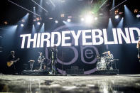 FILE - This Dec. 8, 2018 file photo shows Kryz Reid, from left, Alex Kopp, Stephan Jenkins and Brad Hargreaves of Third Eye Blind performing at the 2018 KROQ Absolut Almost Acoustic Christmas in Inglewood, Calif. Rock band Third Eye Blind pride themselves on never canceling a tour, but with the growing coronavirus, the musicians may have to do something they thought they would never do. (Photo by Amy Harris/Invision/AP, File)