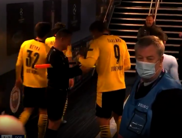 Assistant referee Octavian Sovre asks for Erling Haaland’s autograph (BT Sport)