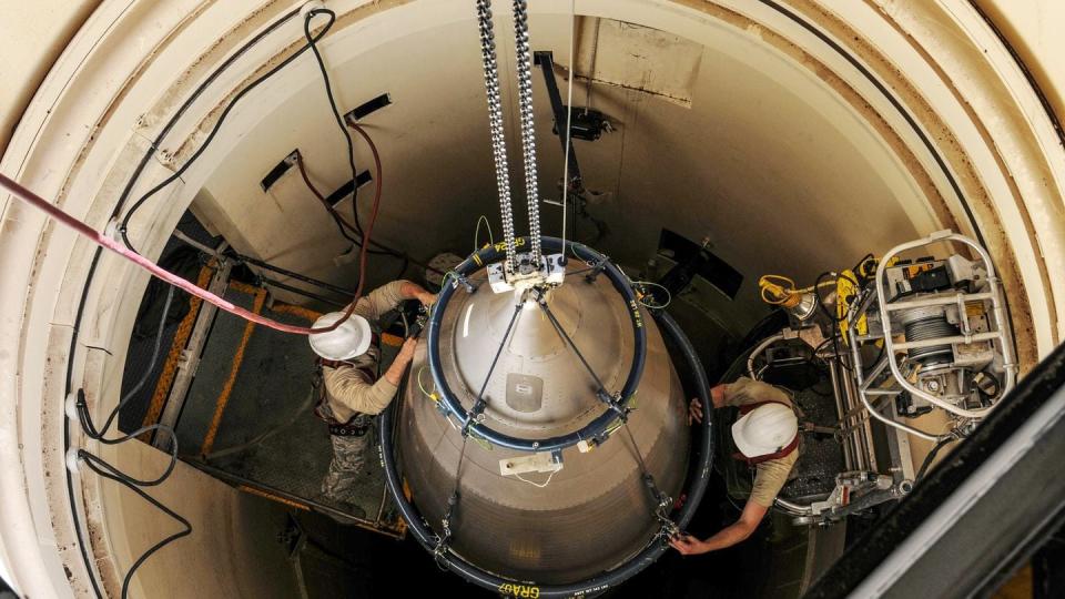 Airmen from the 90th Missile Maintenance Squadron prepare a reentry system for removal from a launch facility, Feb. 2, 2018, in the F. E. Warren Air Force Base missile complex. (Airman 1st Class Braydon Williams/Air Force)