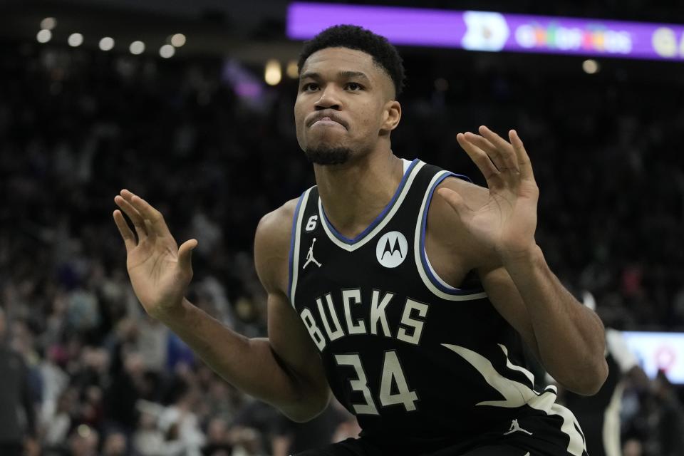 Milwaukee Bucks' Giannis Antetokounmpo reacts after his dunk during the second half of an NBA basketball game against the Cleveland Cavaliers Friday, Nov. 25, 2022, in Milwaukee. (AP Photo/Morry Gash)