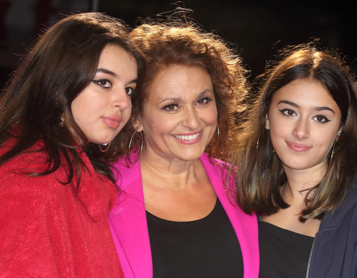 Nadia Sawalha with daughters Maddie and Kiki-Bee attend The BFI 63rd London Film Festival, American Express Gala screening of 'Knives Out held at the Odeon Luxe, Leicester Square in London. (Photo by Keith Mayhew / SOPA Images/Sipa USA)