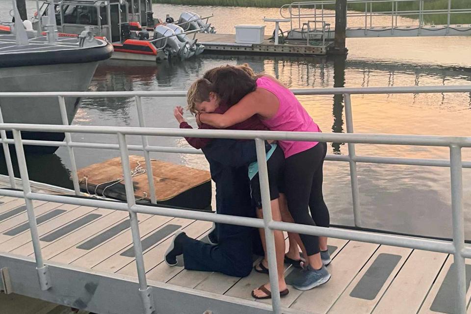 <p>USCG Mid-Atlantic/Twitter</p> The missing divers reunited with their families
