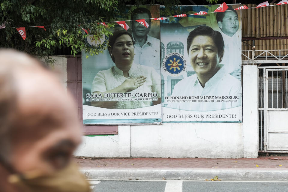 FiILE PHOTO: Posters featuring Sara Duterte-Carpio, Philippines' vice president, left, Ferdinand Marcos Jr., Philippines' president, on a wall in Manila, the Philippines, Oct. 22, 2023. (Photo: Veejay Villafranca/Bloomberg)