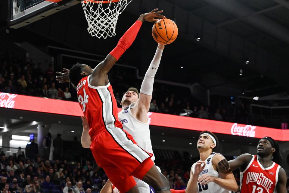 Ohio State center Felix Okpara defends against Northwestern's Robbie Beran.