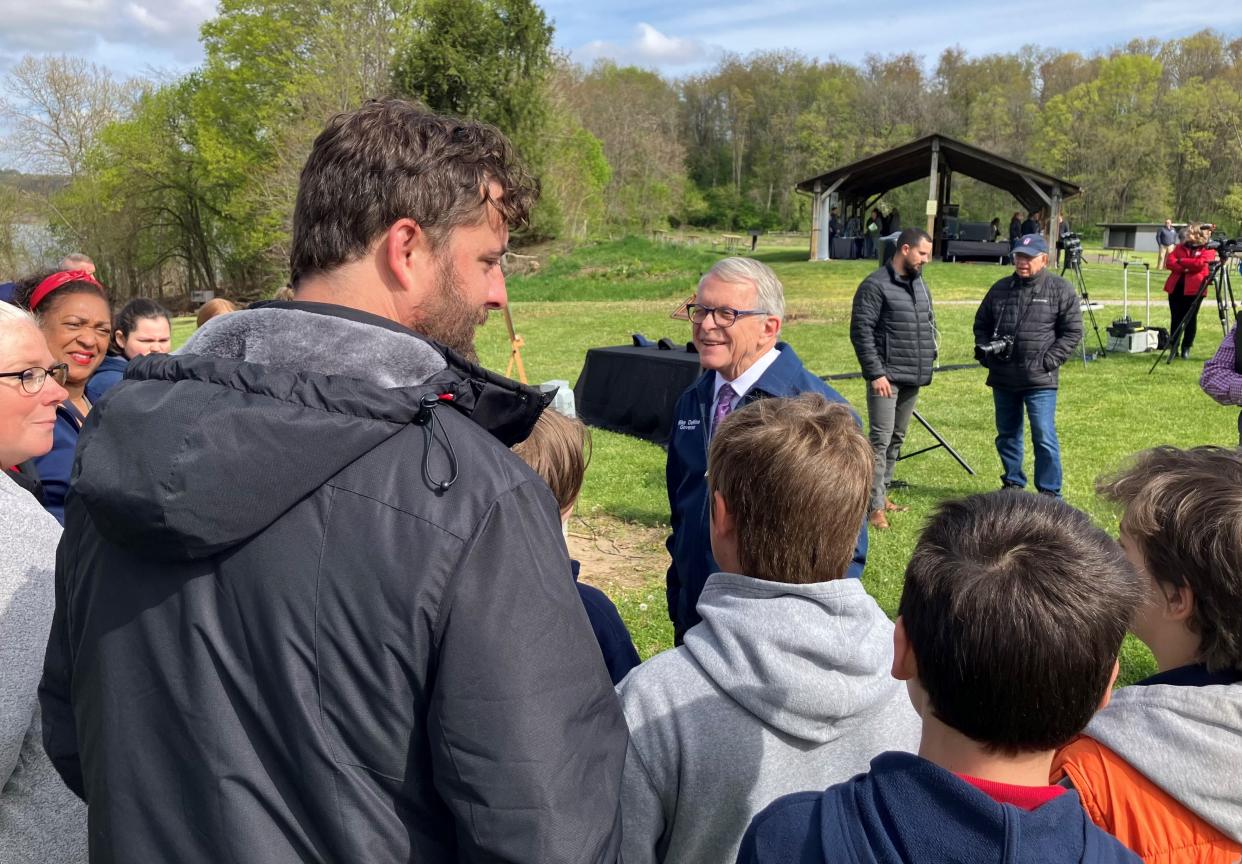 Gov. Mike DeWine talks to students from Par Excellence STEM Academy in Newark during the wetlands announcement Thursday at Dillon State Park.