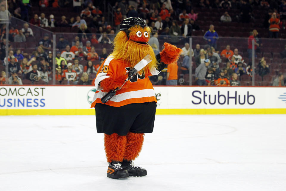 The Philadelphia Flyers mascot, Gritty, takes to the ice during the first intermission of the Flyers' preseason NHL hockey game against the Boston Bruins, Monday, Sept, 24, 2018, in Philadelphia. (AP Photo/Tom Mihalek)