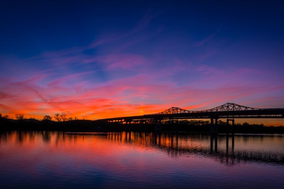 Sunset over the Whitesburg bridge at Ditto Landing in Huntsville, Alabama. via Getty Images