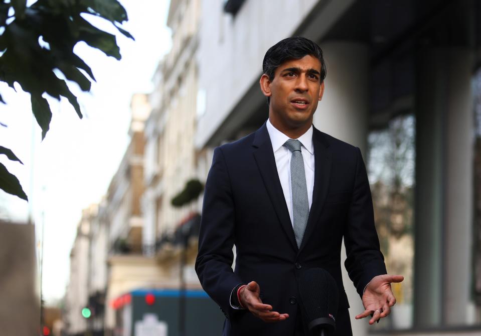 Chancellor of the Exchequer Rishi Sunak talks during a TV interview in London (REUTERS)