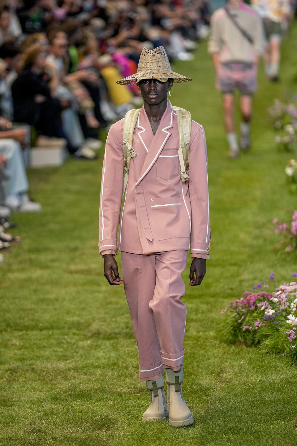 A model wears a creation as part of the Dior men's Spring Summer 2023 collection presented in Paris, France, Friday, June 24, 2022. (AP Photo/Michel Euler)