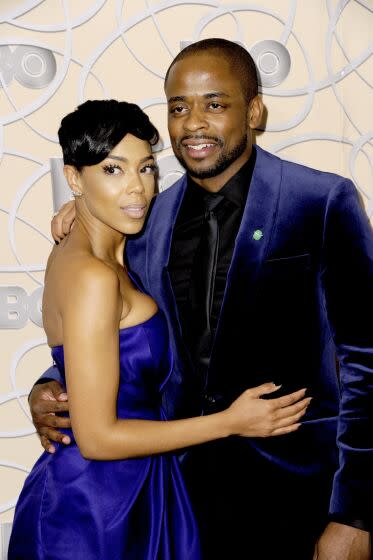 Actors Jazmyn Simon, left, and husband Dule Hill arrive at an awards after party