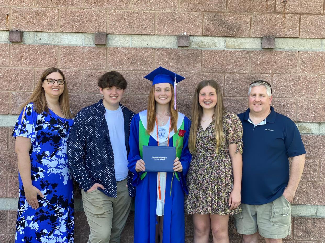 Sharon Smith, Gavin Smith, Trinity Smith, Aubree Smith and Brent Smith pose for a photo at a Lakewood High School graduation ceremony.