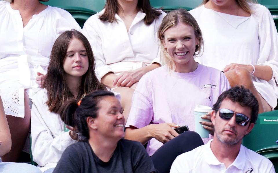 Katie Boulter (centre, right) watching Alex de Minaur on day eight of the 2022 Wimbledon Championships at the All England Lawn Tennis and Croquet Club, Wimbledon. Picture date: Monday July 4, 2022 - Adam Davy/PA