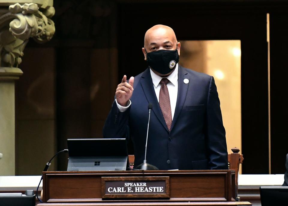 Assembly Speaker Carl Heastie, D-Bronx, speaks to members of the New York Assembly after passing a state budget during a Legislative session at the state Capitol, late Wednesday, April 7, 2021, in Albany, N.Y. (AP Photo/Hans Pennink)