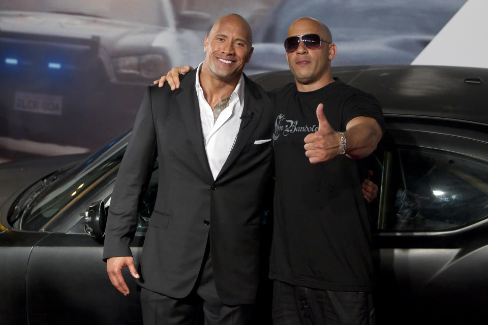 RIO DE JANEIRO, BRAZIL - APRIL 15:   Dwayne Johnson (The Rock) and Vin Diesel (R) pose for photographers during the premiere of the movie 