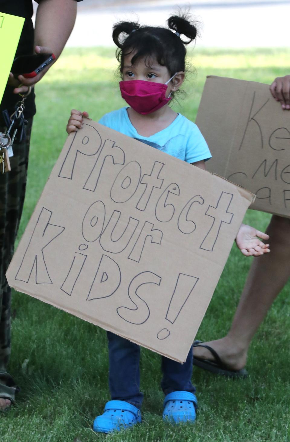 Hazel Maeda, 3, of Spring Valley participates in a rally at the East Ramapo school district offices in Spring Valley May 25, 2021.