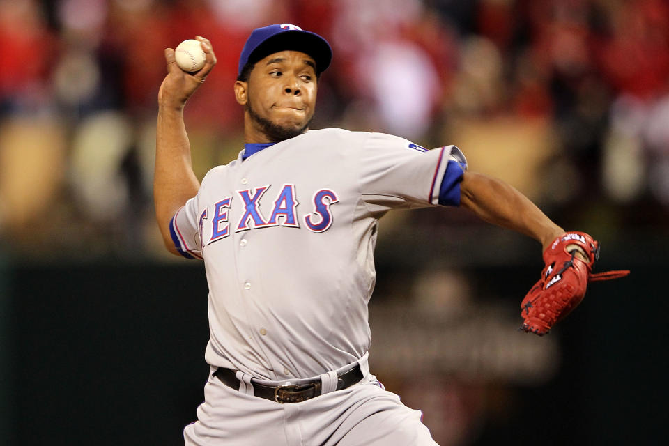 ST LOUIS, MO - OCTOBER 20: Neftali Feliz #30 of the Texas Rangers pitches in the ninth inning during Game Two of the MLB World Series against the St. Louis Cardinals at Busch Stadium on October 20, 2011 in St Louis, Missouri. The Rangers won 2-1. (Photo by Jamie Squire/Getty Images)