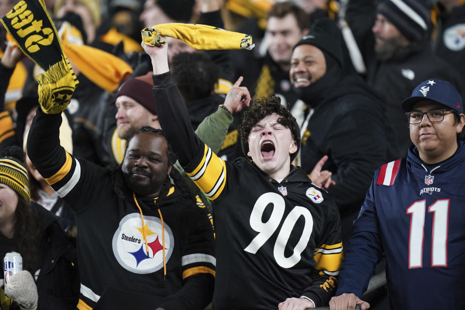 Pittsburgh Steelers fans cheer during the second half of an NFL football game between the Pittsburgh Steelers and the New England Patriots on Thursday, Dec. 7, 2023, in Pittsburgh. (AP Photo/Matt Freed)