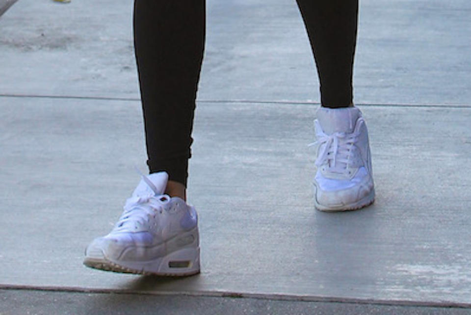 A closer look at Kimora Lee Simmons’ white Nike sneakers. - Credit: MEGA