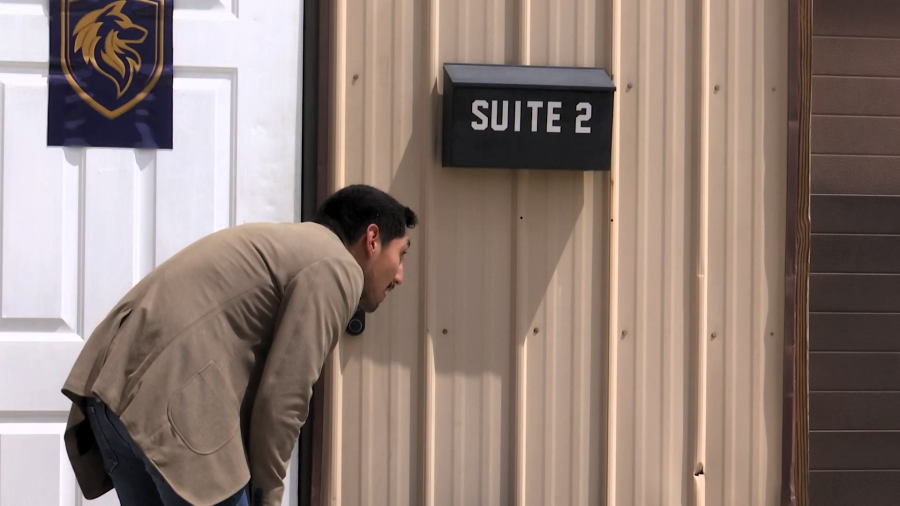 6 News reporter Josh Sanchez listens to a Ring doorbell greeting at VSDO. (WLNS)