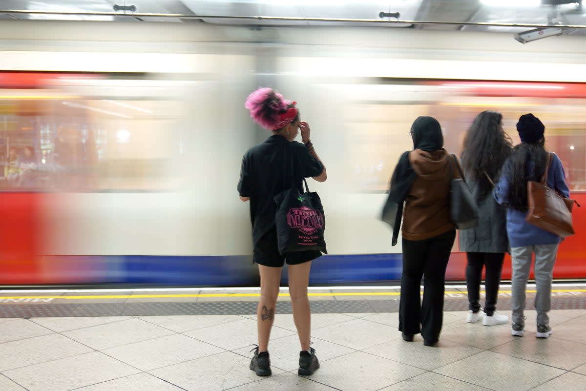 People wait for Circle and District line trains at Westminster (file picture) (PA)