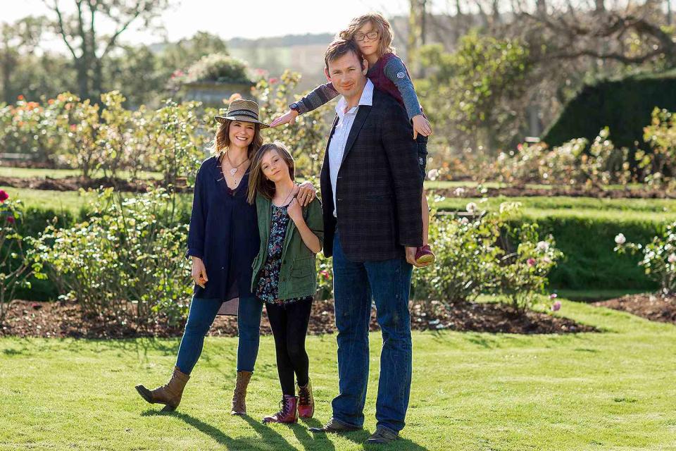 <p>Julian Broad/Getty</p> AJ Langer, Charles Courtenay and their children Joscelyn and Jack photographed at home at Powderham Castle in Devon, UK on October 27, 2017
