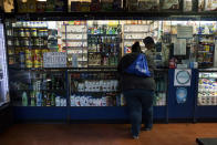 <p>A woman suffering from severe obesity buys some medicine at a pharmacy. Mexico has one of the highest overall obesity rates in the world — 32.4 percent, putting it just behind the U.S., although it has at times surpassed it. (Photograph by Silvia Landi) </p>