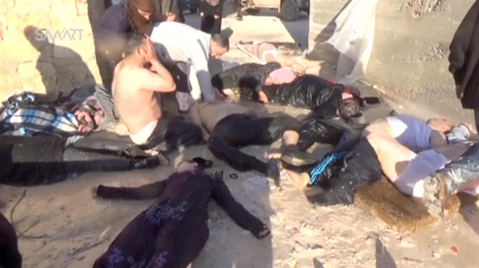 A still image taken from a video posted to a social media website on April 4, 2017, shows people lying on the ground said to be in the town of Khan Sheikhoun, after what rescue workers described as a suspected gas attack in rebel-held Idlib, Syria.