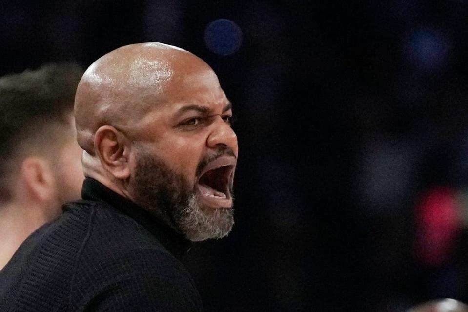 Cavaliers coach J.B. Bickerstaff shouts during a game against the Brooklyn Nets on Jan. 11 at the Accor Arena in Paris.