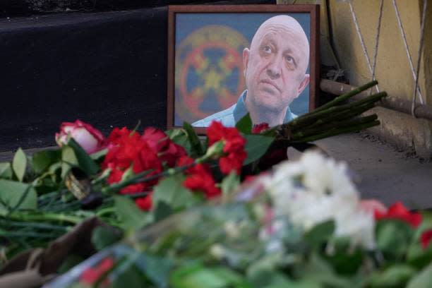 A portrait of Yevgeny Prigozhin is seen at the makeshift memorial in front of the circus building in Rostov-on-Don, on 24 August 2023 (AFP via Getty Images)