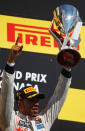 MONTREAL, CANADA - JUNE 10: Lewis Hamilton of Great Britain and McLaren celebrates on the podium after winning the Canadian Formula One Grand Prix at the Circuit Gilles Villeneuve on June 10, 2012 in Montreal, Canada. (Photo by Paul Gilham/Getty Images)