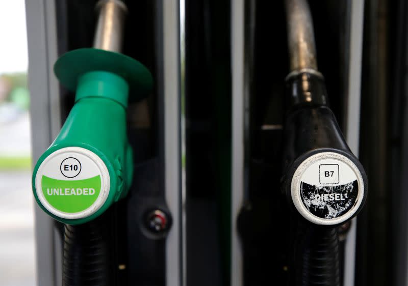 A petrol pump with the new E10 grade of unleaded petrol is pictured next to a Diesel nozzle at a filling station in Liverpool