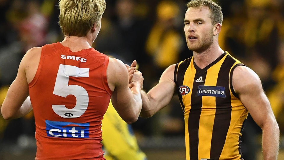 Tom Mitchell in action against his former club. (Photo by Quinn Rooney/Getty Images)