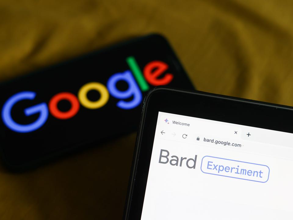 Google logo displayed on a phone screen and Bard website displayed on a laptop screen are seen in this illustration photo taken in Krakow, Poland on March 21, 2023.