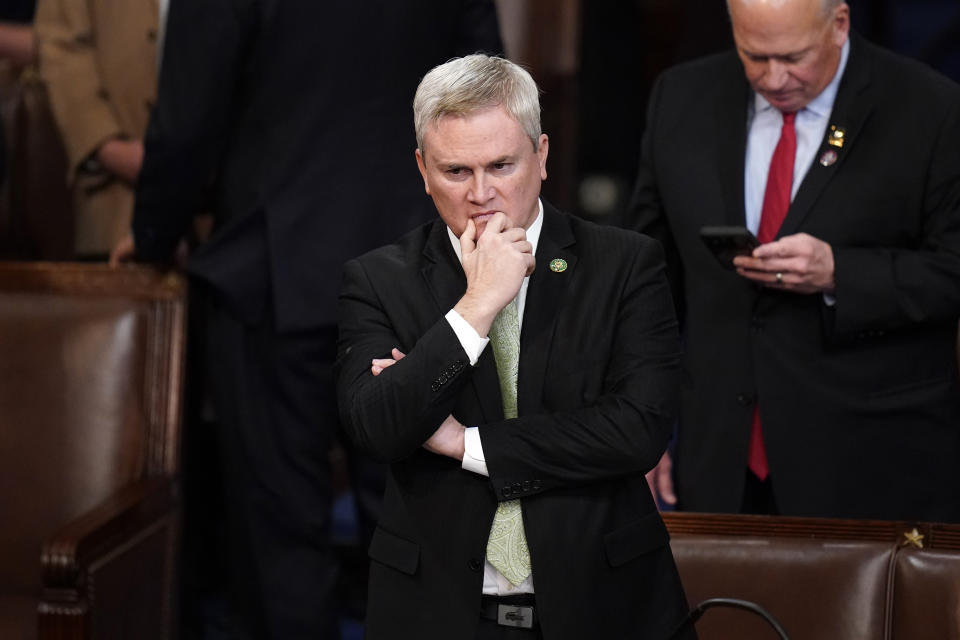 FILE - Rep. James Comer, R-Ky., stands to nominate Rep. Kevin McCarthy, R-Calif., for a 13th round of voting in the House chamber as the House meets for the fourth day to elect a speaker and convene the 118th Congress in Washington, Jan. 6, 2023. (AP Photo/Alex Brandon, File)