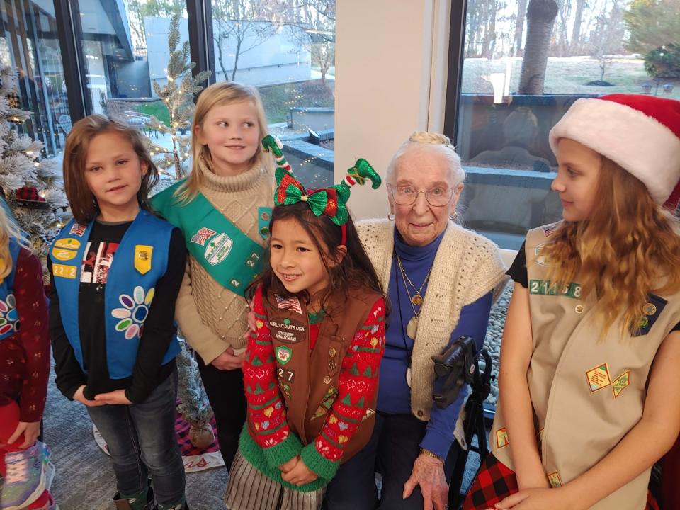 Girl Scouts visited Commonwealth Senior Living in Oak Ridge to wish Happy 100th Birthday to Girl Scout emerita Eileen Neiler. Pictured from left are Grace Coffman, Lilly Coffman, Honora Oakgrove, Neiler, and Ruby Price.