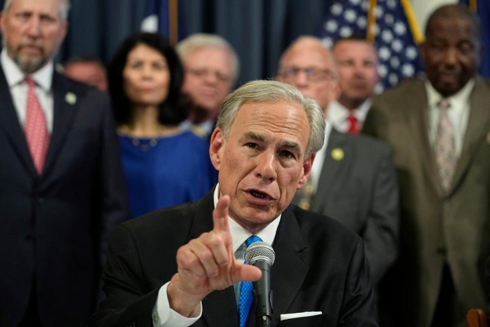 Texas governor Greg Abbott has used Covid funds and a state disaster declaration to increase his power over the US-Mexico border (AP)