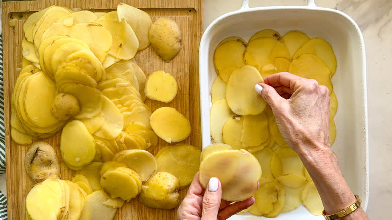 sliced potatoes in pan