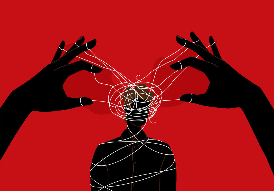 Graphic to represent gaslighting with image of hands manipulating a man's mind. (Getty Images)