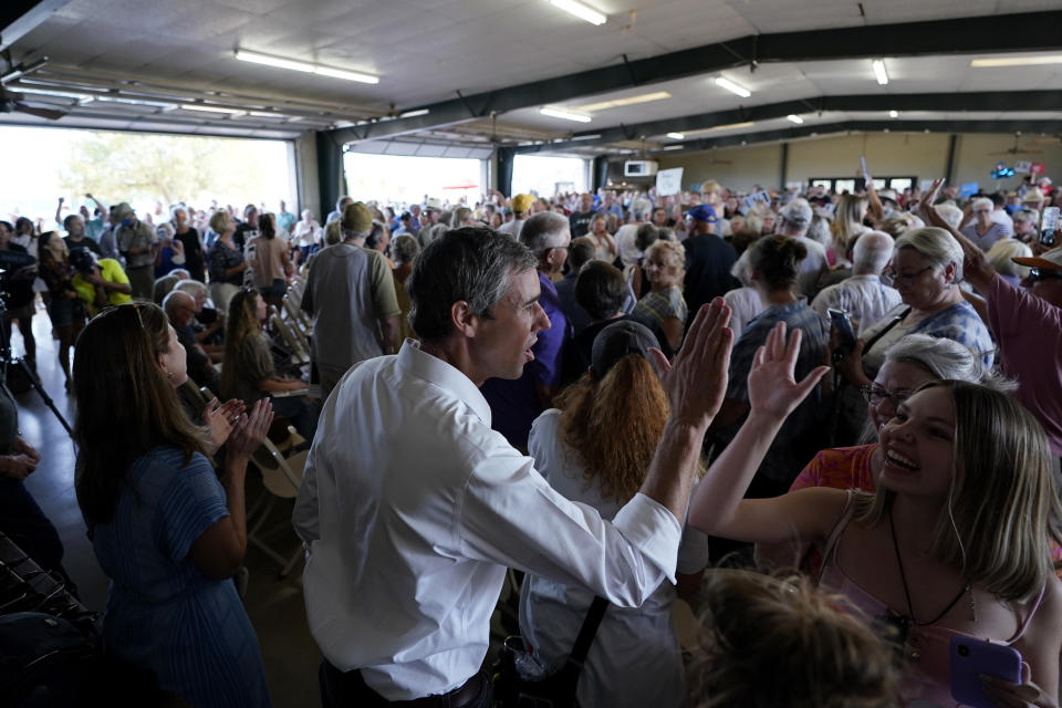 Texas Democratic gubernatorial candidate Beto O'Rourke greets supporters, Wednesday, Aug. 17, 2022, in Fredericksburg, Texas. On the brink of November's midterm elections, both full-time election workers in rural Gillespie County suddenly and stunningly quit this month with less than 70 days before voters start casting ballots. (AP Photo/Eric Gay)