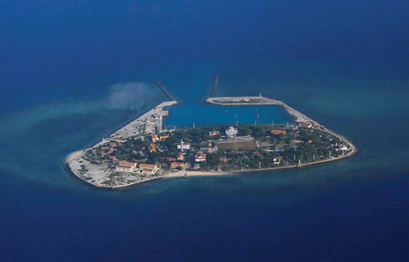 FILE PHOTO: An aerial view of Southwest Cay, also known as Pugad Island, controlled by Vietnam and part of the Spratly Islands in the disputed South China Sea, April 21, 2017. REUTERS/Francis Malasig/Pool