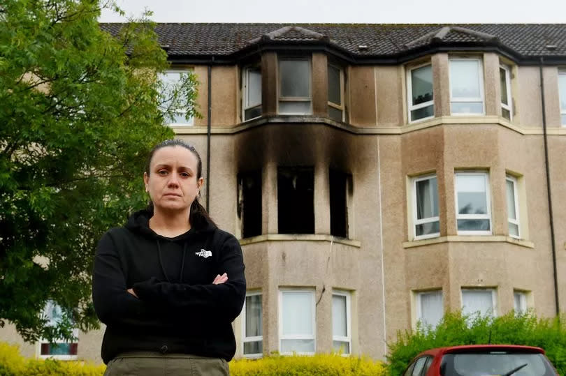 Yvonne outside the house on Brand Street in Govan