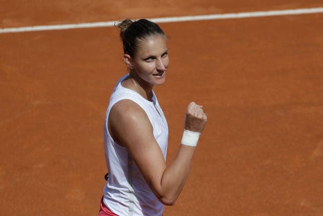 Karolina Pliskova celebrates after beating Petra Martic