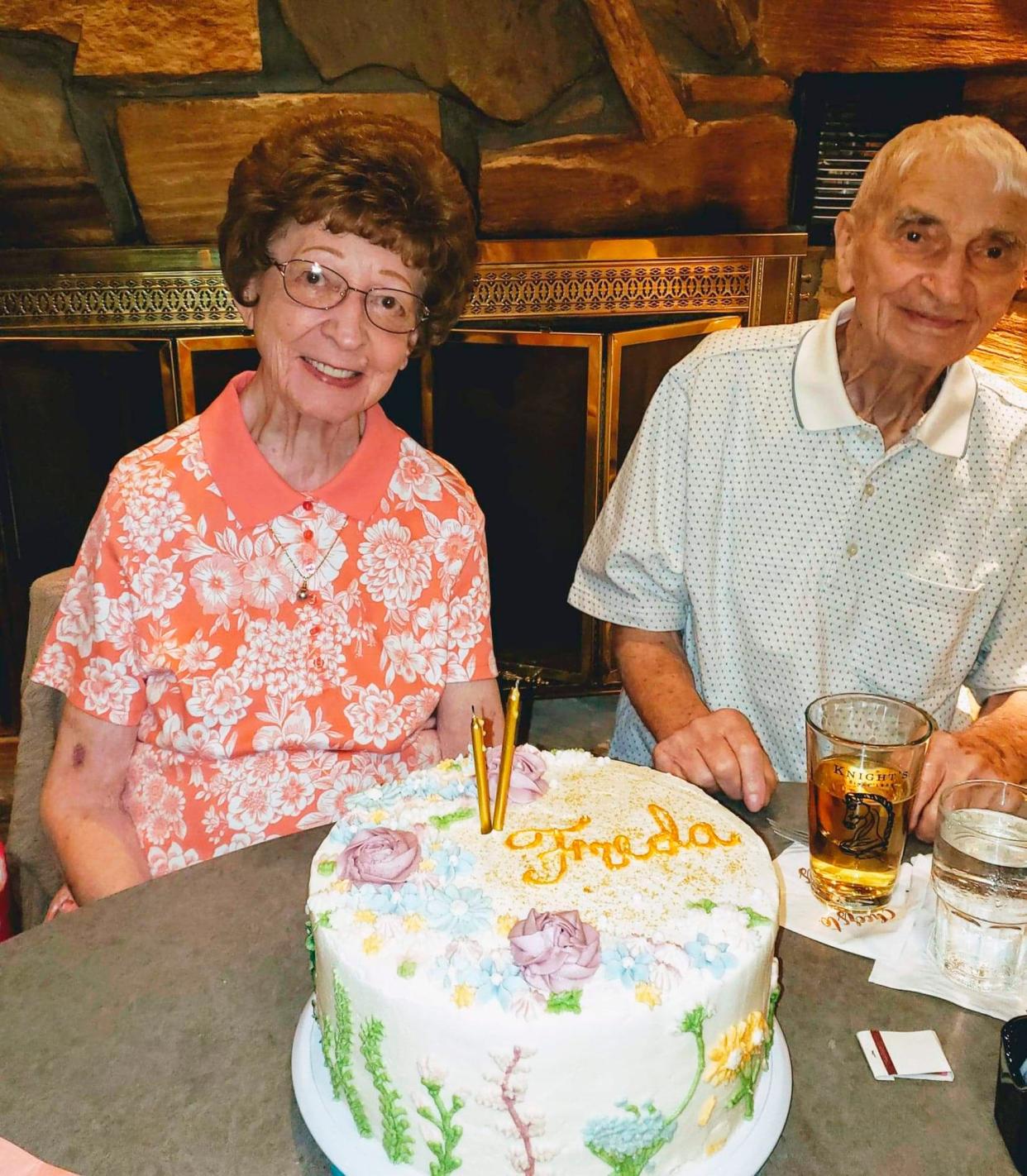 This June 2019 photo provided by Leah Smith shows Les and Freda Austin of Jackson, of Michigan, pose for a photo at a birthday party. The Michigan couple, who family members say did everything together for 70 years up to their final breaths, died 20 minutes apart in the same hospice care on Dec. 6, MLive.com reports.